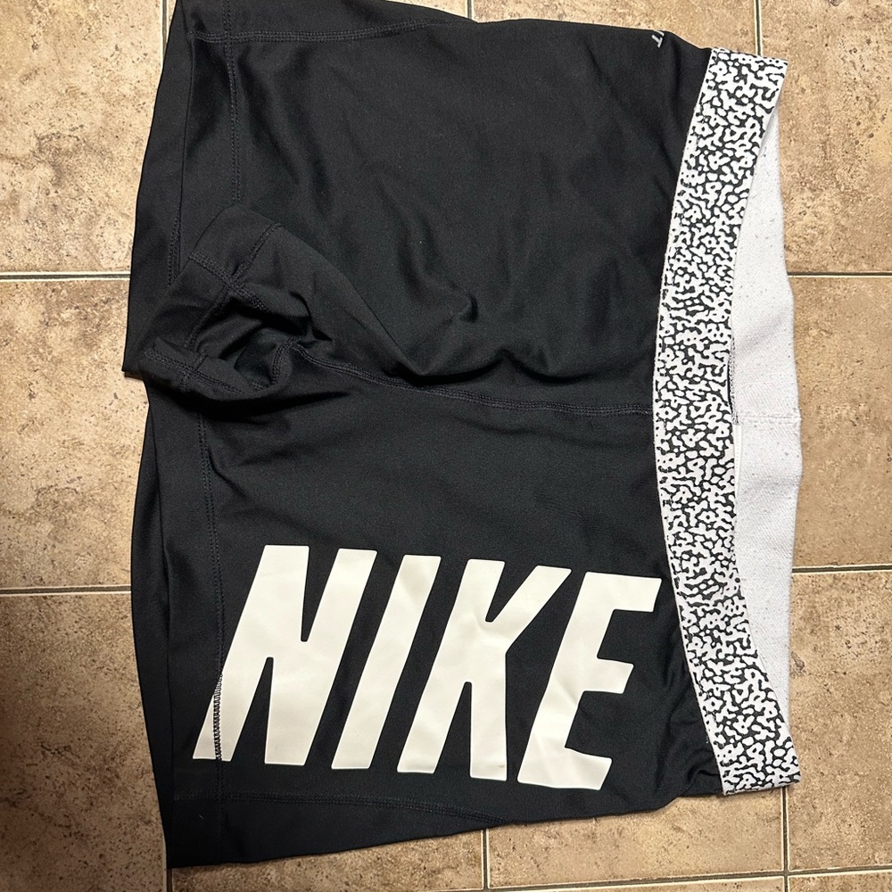 Nike Black Shorts with White Logo and Patterned Waistband